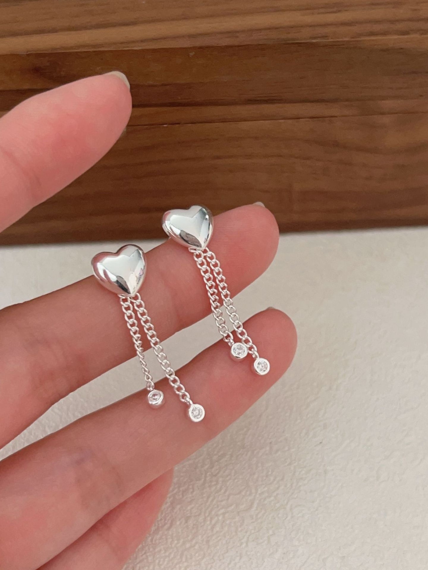 HEART TASSEL EARRINGS