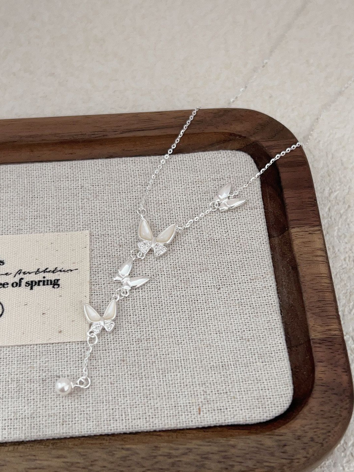 BUTTERFLY FRINGE NECKLACE