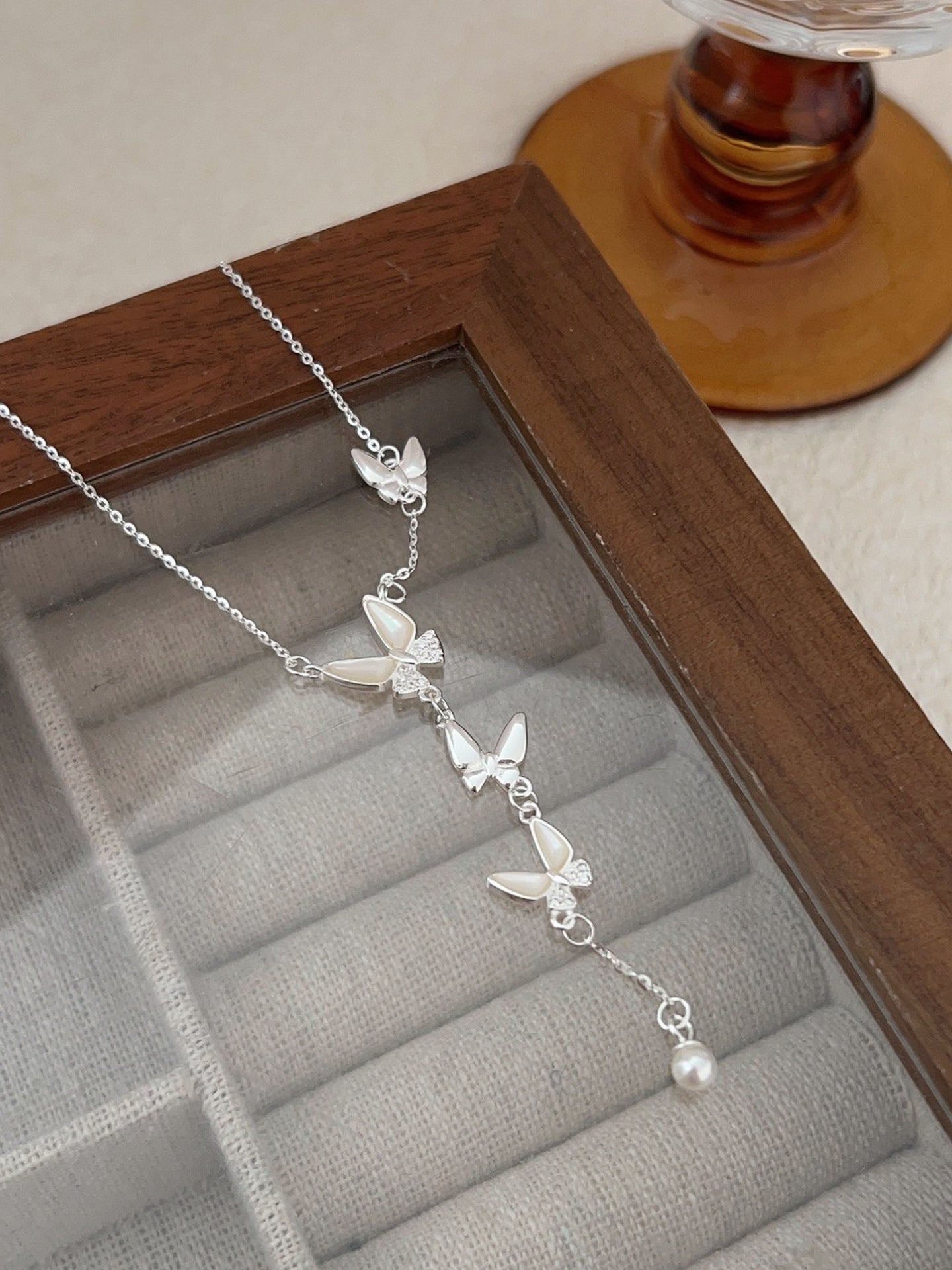 BUTTERFLY FRINGE NECKLACE