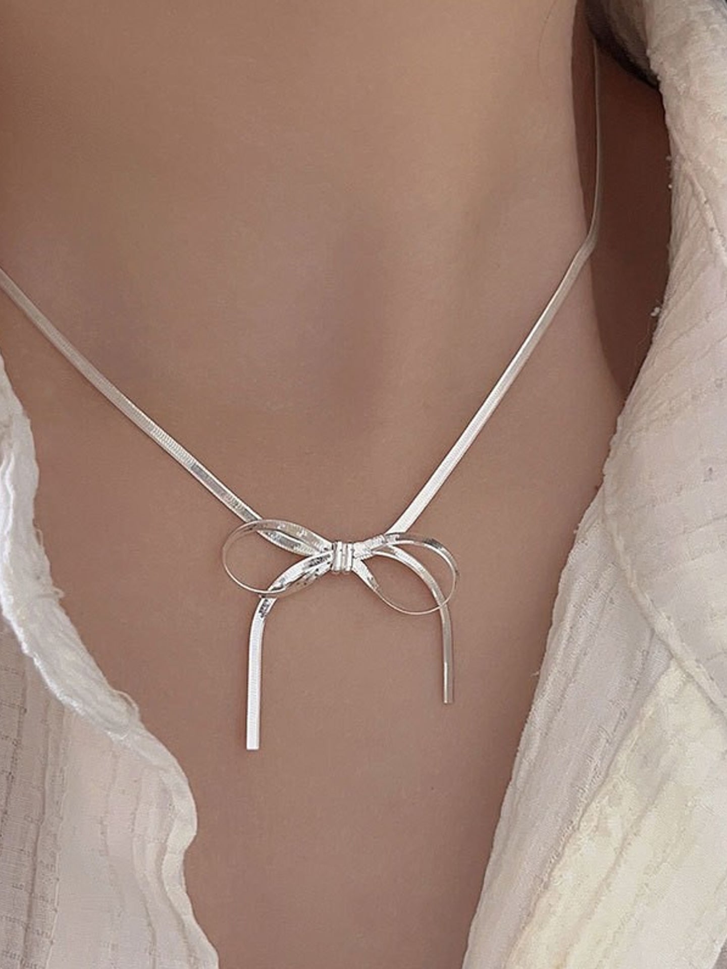 BLADE BOW NECKLACE