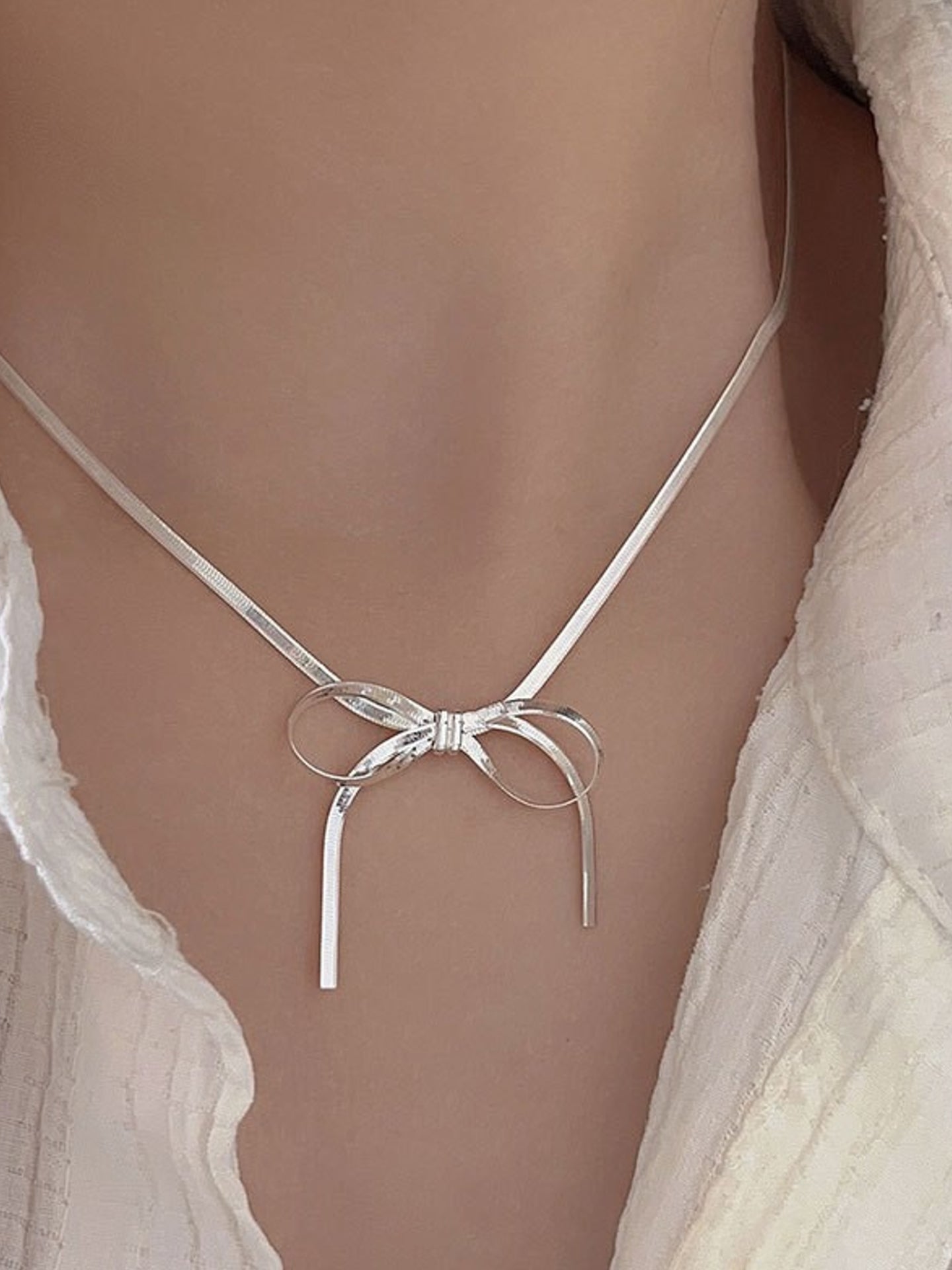 BLADE BOW NECKLACE