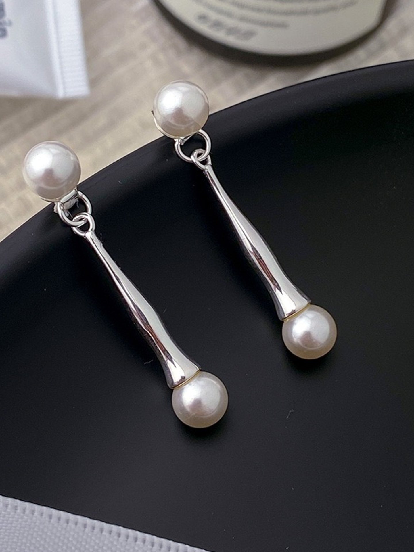 PEARL TEARDROP SWING