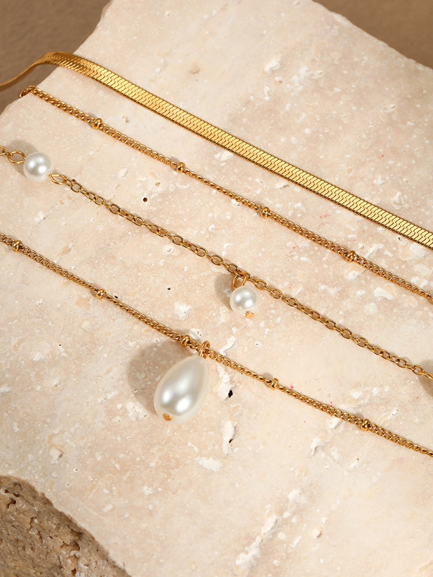 QUADRUPLE PEARL MELODY