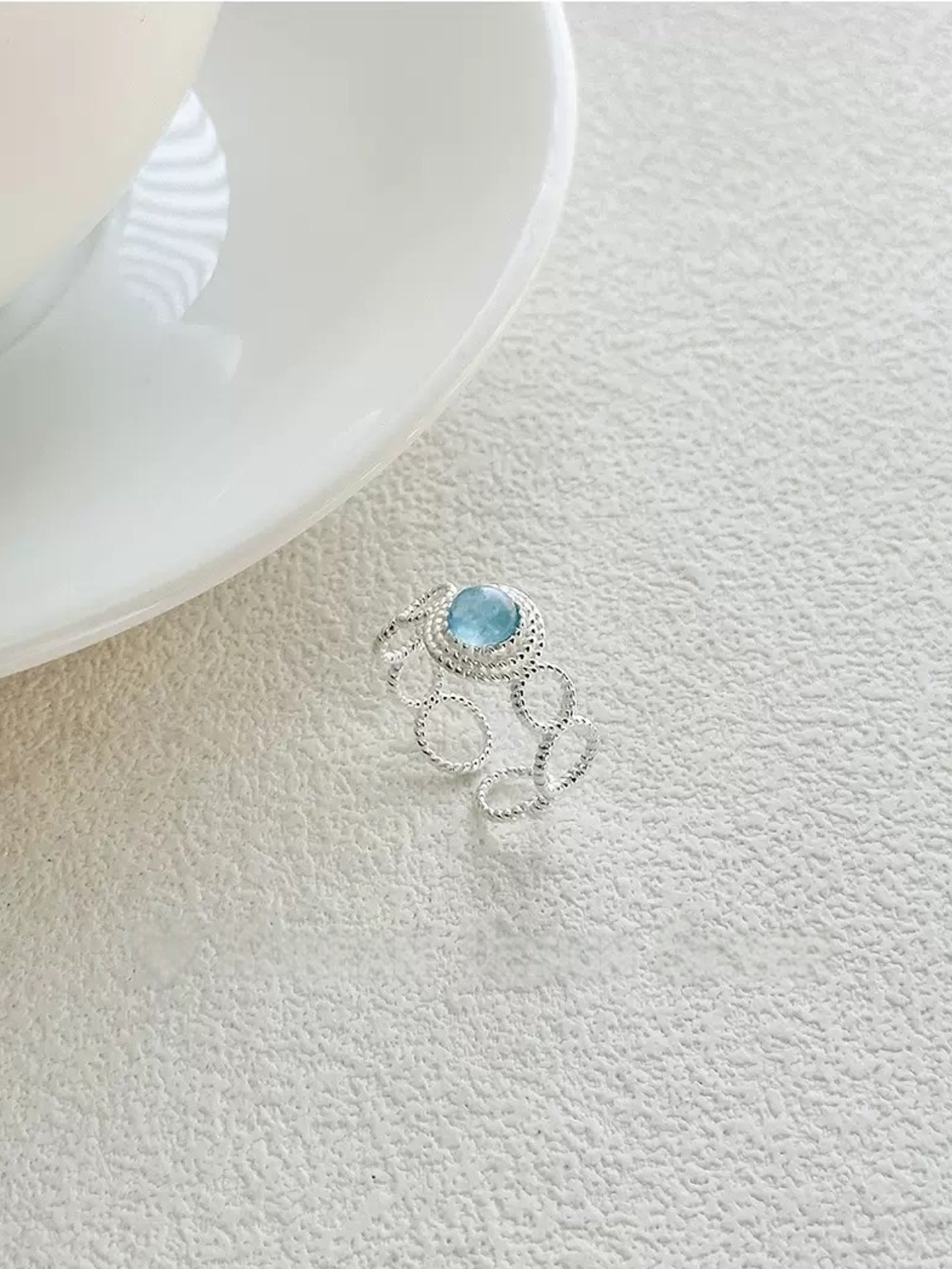 AQUAMARINE TWISTED RING