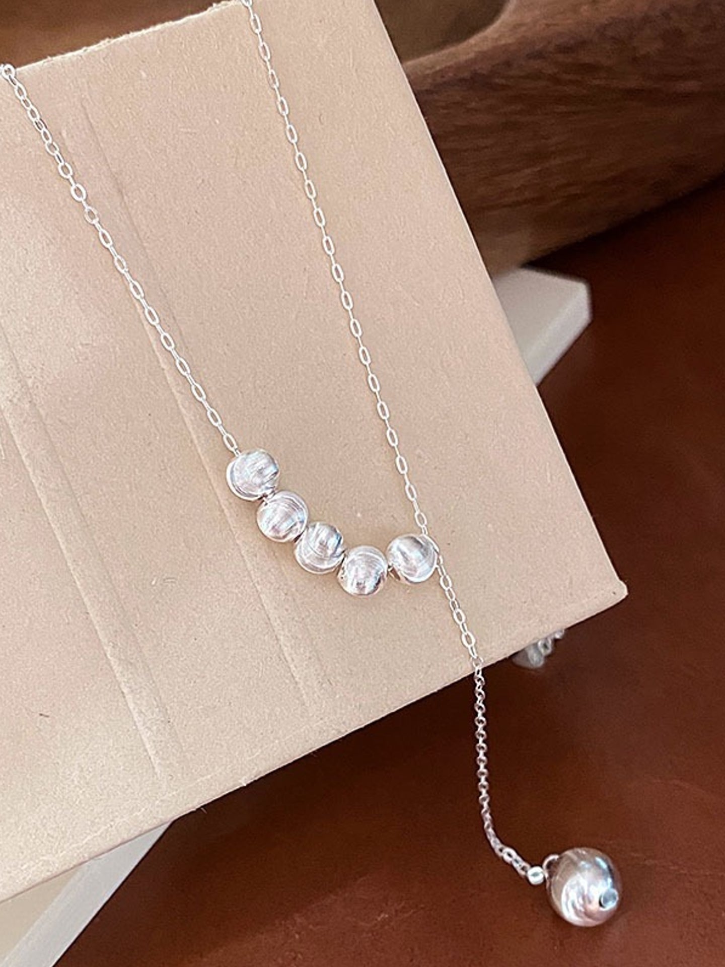 CAT'S EYE TASSEL NECKLACE