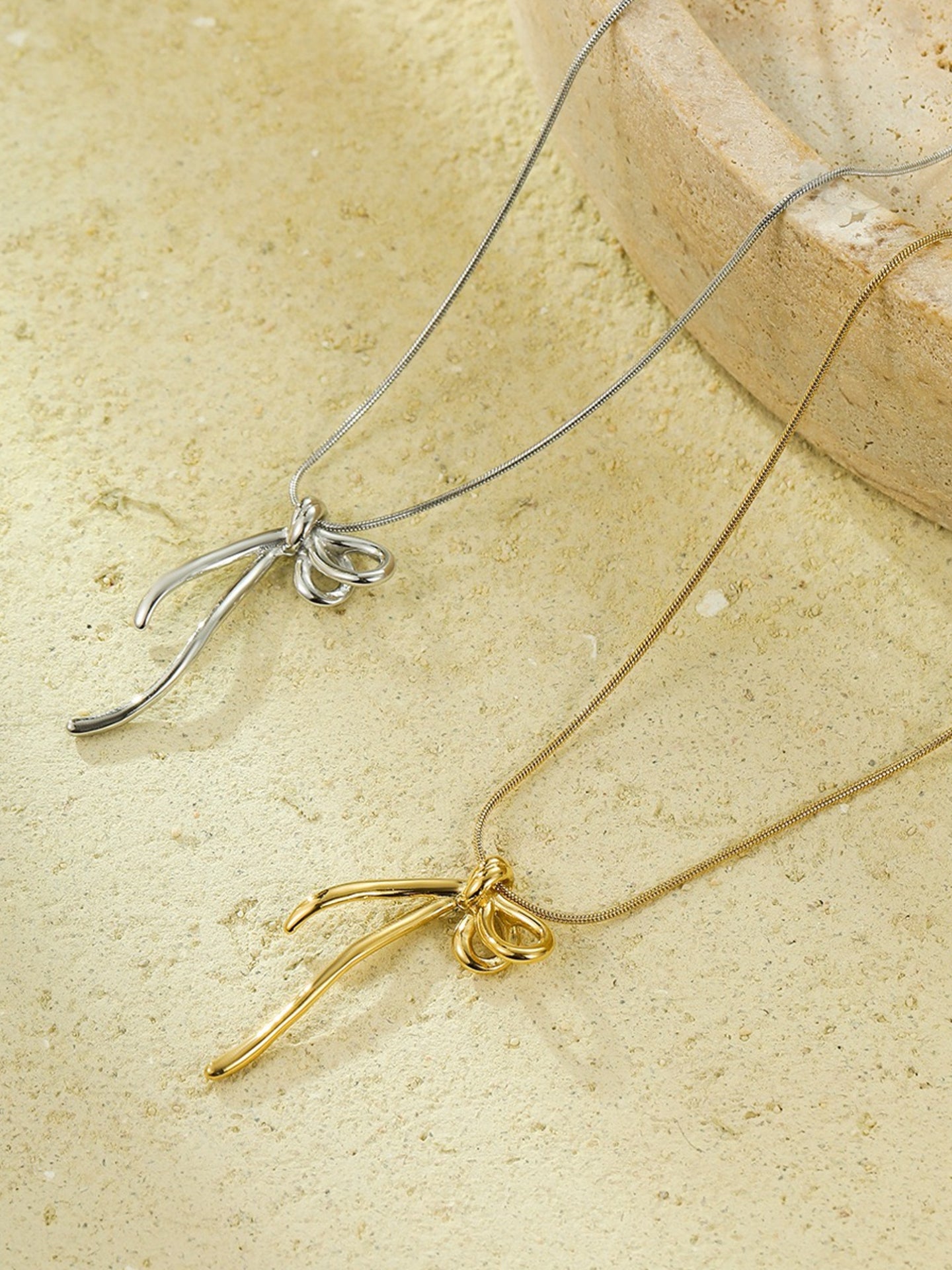 MINIMALIST BOW NECKLACE