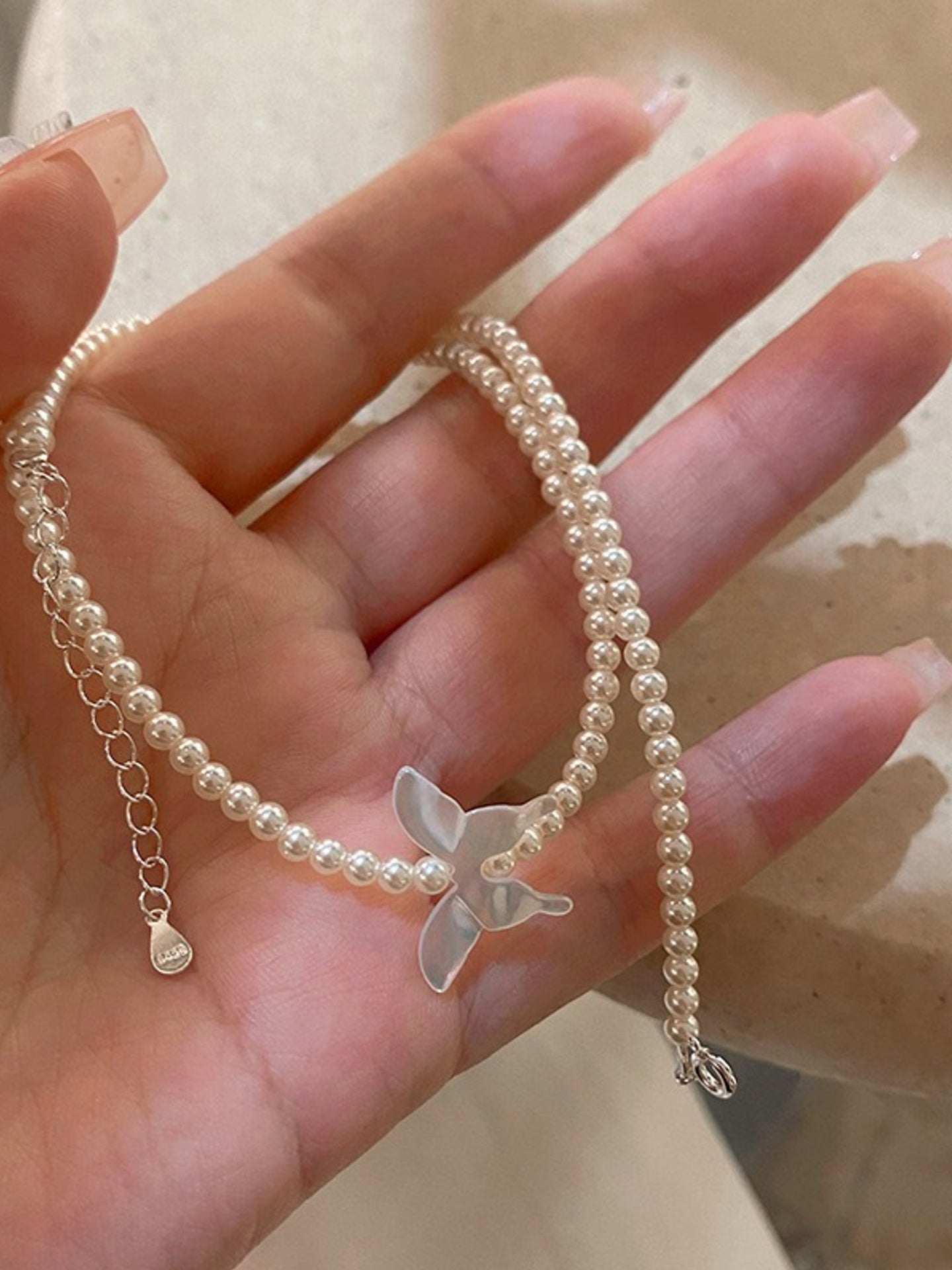 PEARL BOW WHISPER