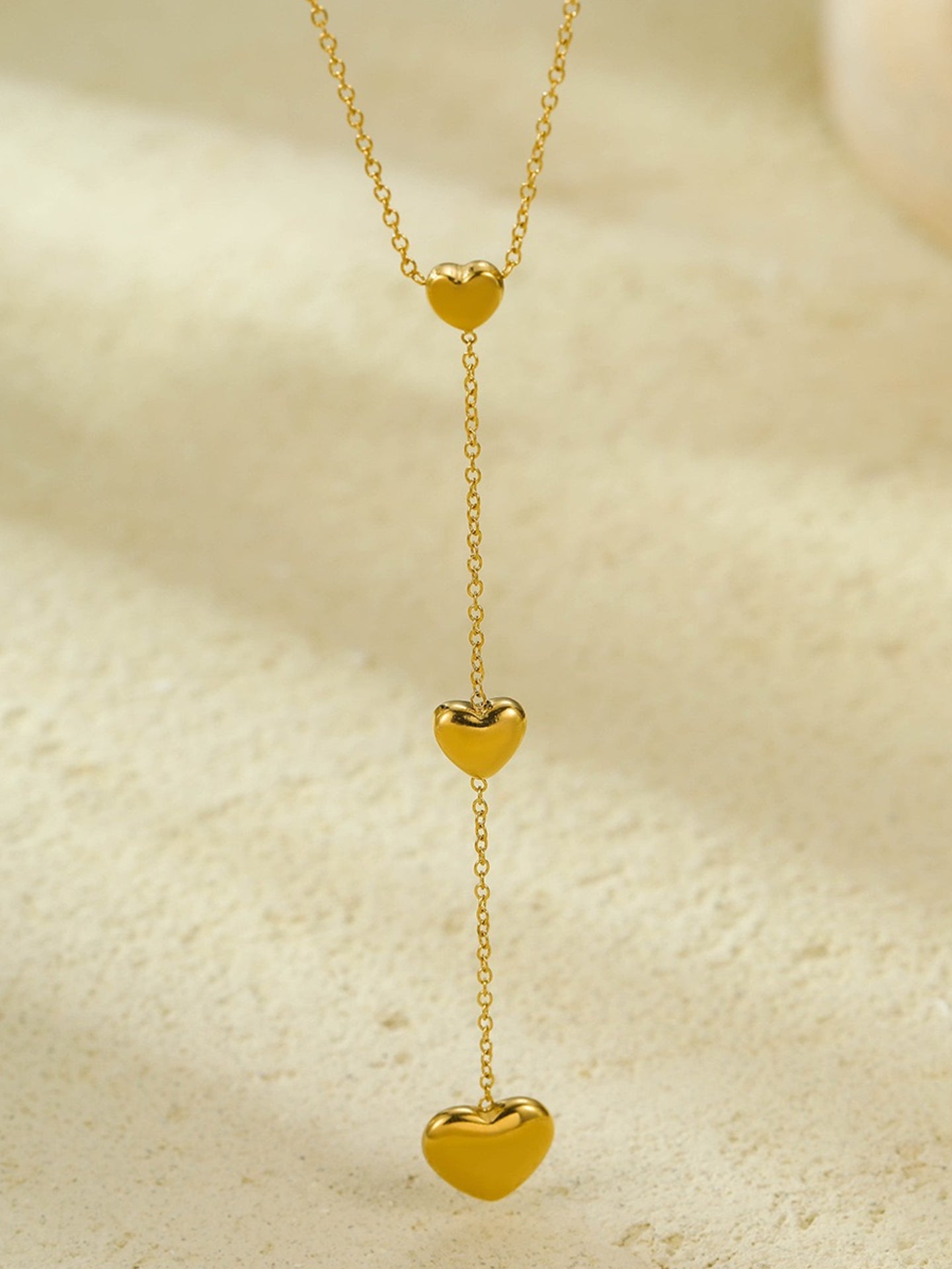 HEART TASSEL NECKLACE