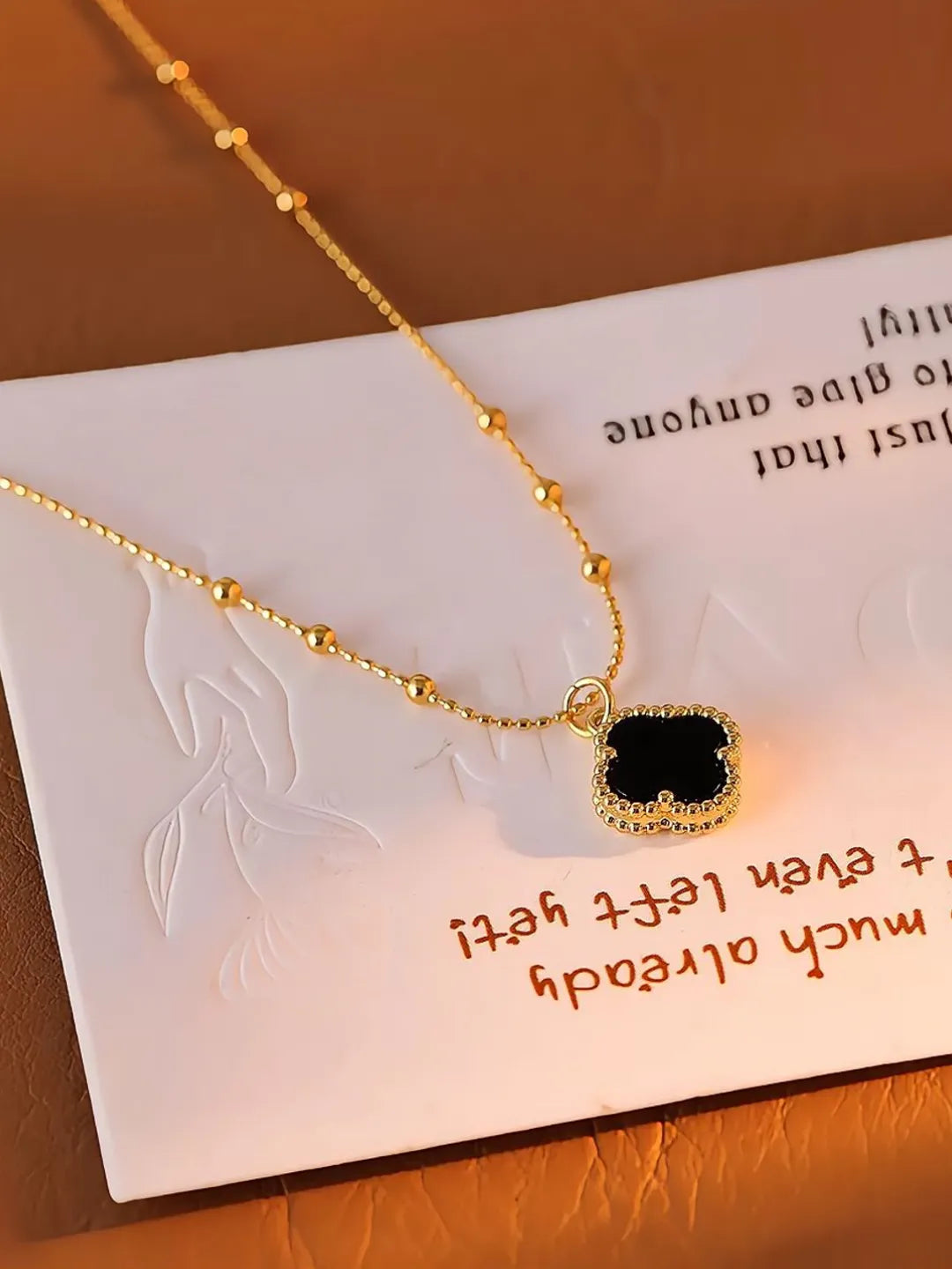BLACK CLOVER NECKLACE
