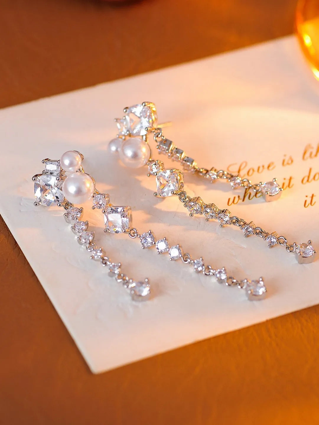 DAZZLING HEART TASSEL EARRINGS