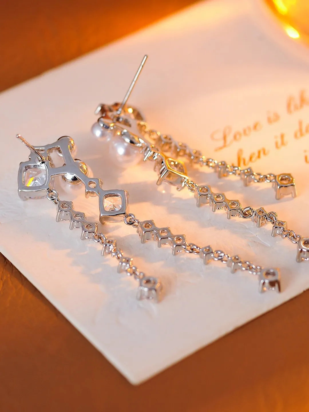 DAZZLING HEART TASSEL EARRINGS