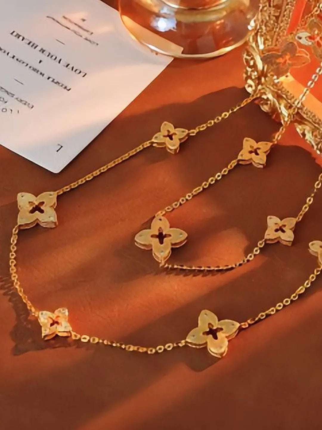 FOUR-LEAF CLOVER SWEATER NECKLACE