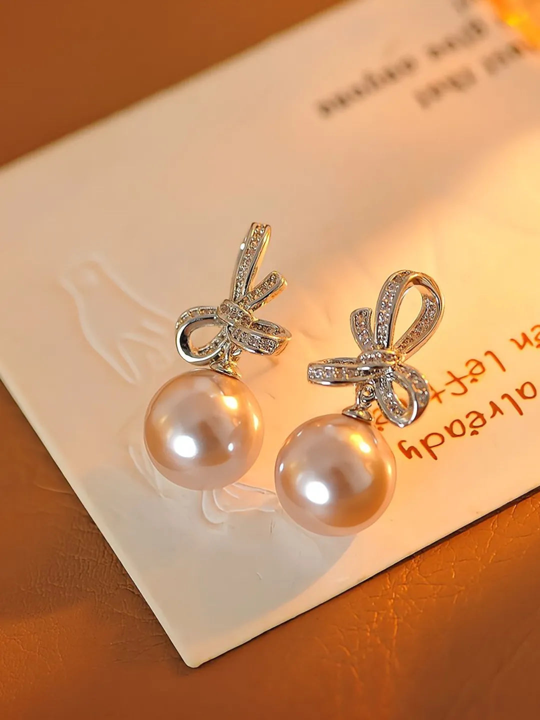 BOW PEARL EARRINGS