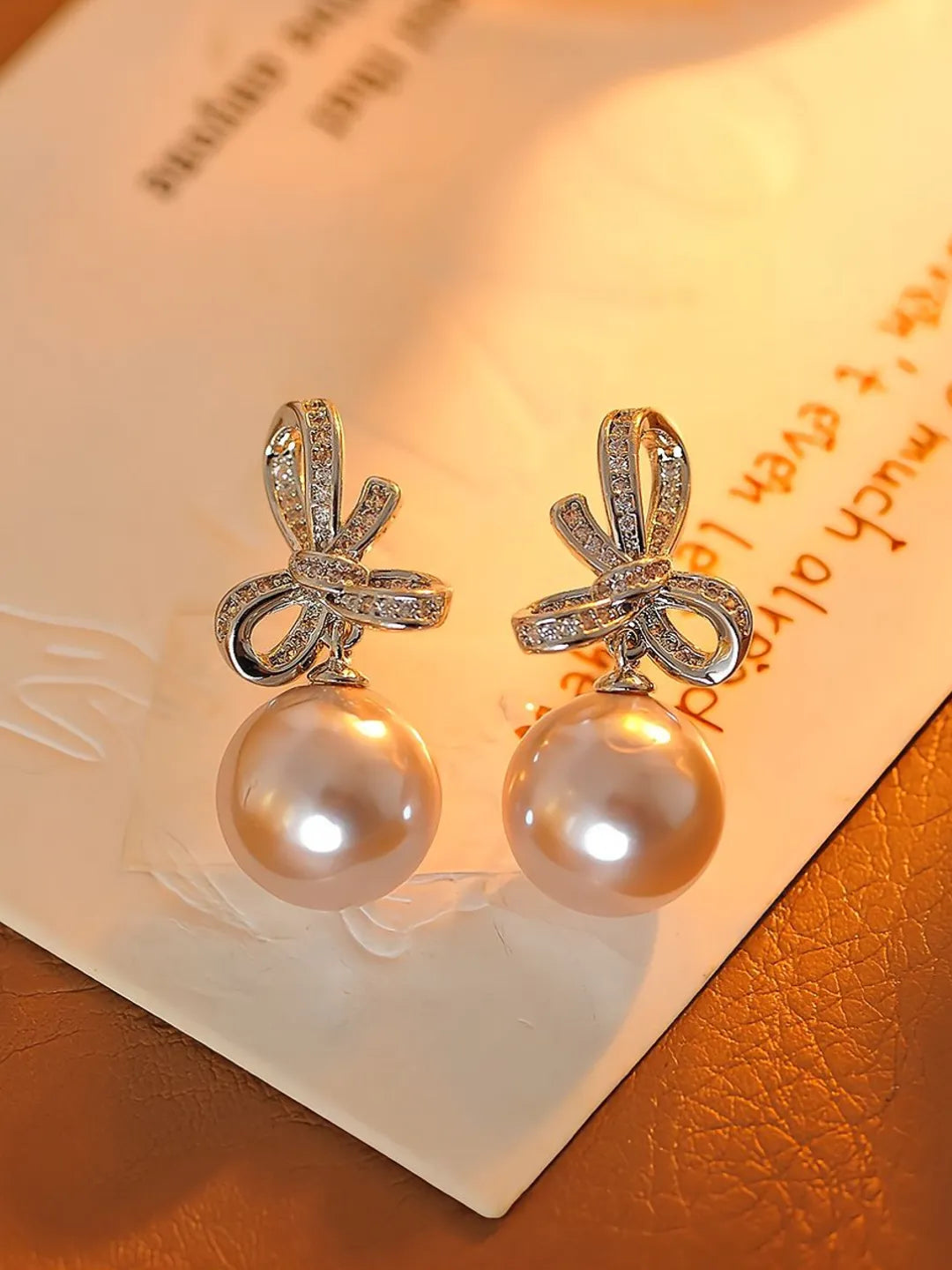 BOW PEARL EARRINGS