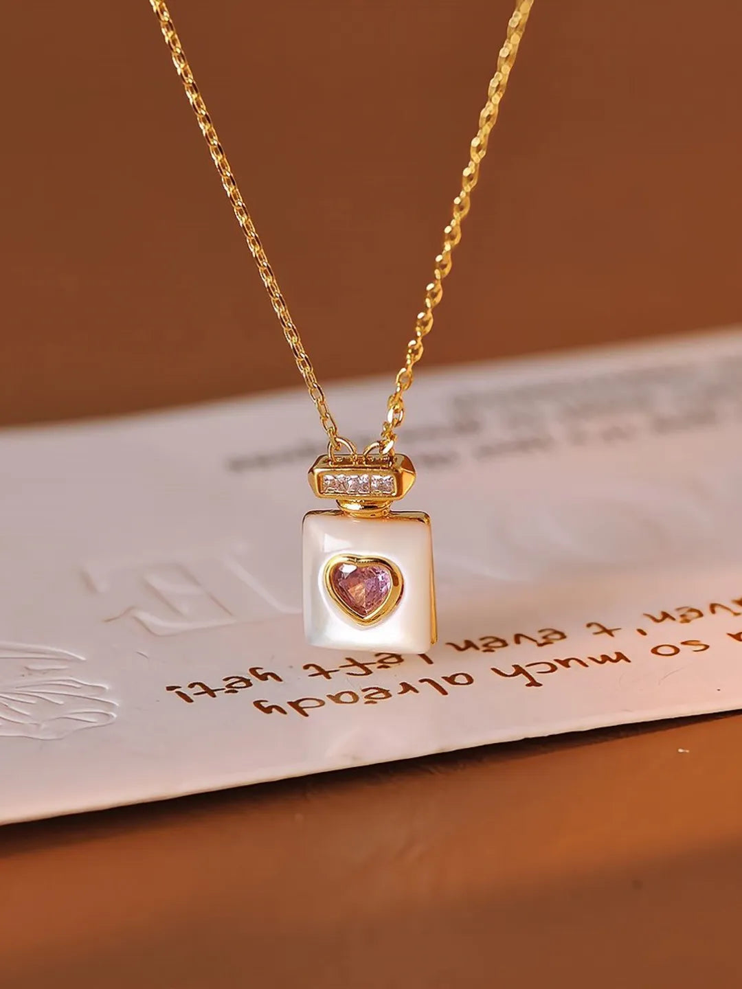 PERFUME BOTTLE NECKLACE