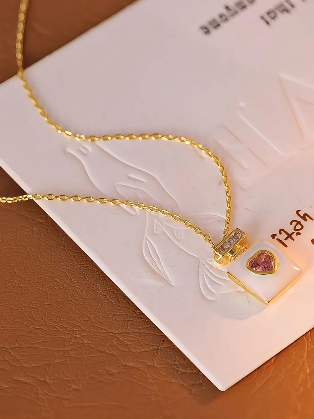 PERFUME BOTTLE NECKLACE