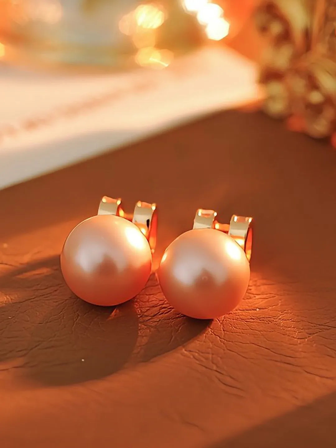 REVERSIBLE PEARL EARRINGS